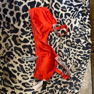 Victoria’s Secret red swim top, new with tags, never worn, size large